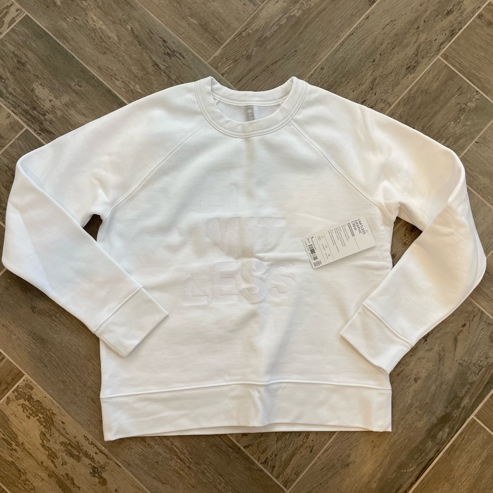 White athelta “limitless” sweatshirt